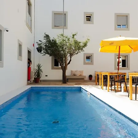 Ptm Downtown Hostel&suites 旅馆